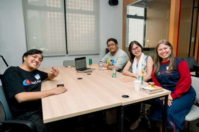 Clay Club Manila members hanging out together at a meetup table