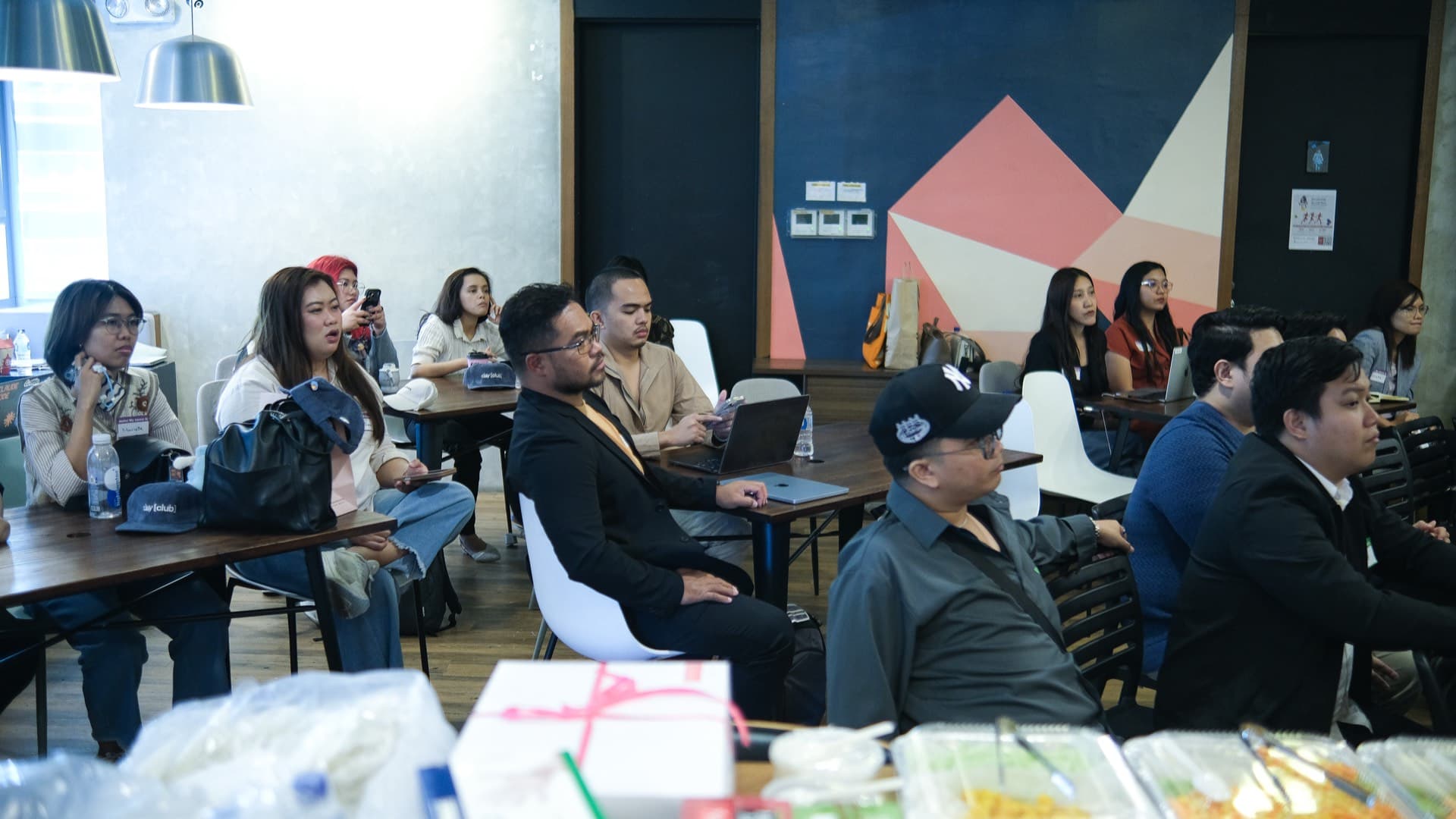 Clay Club Manila attendees engaged and taking notes during GTM engineering presentation at Acceler8 Rockwell Makati