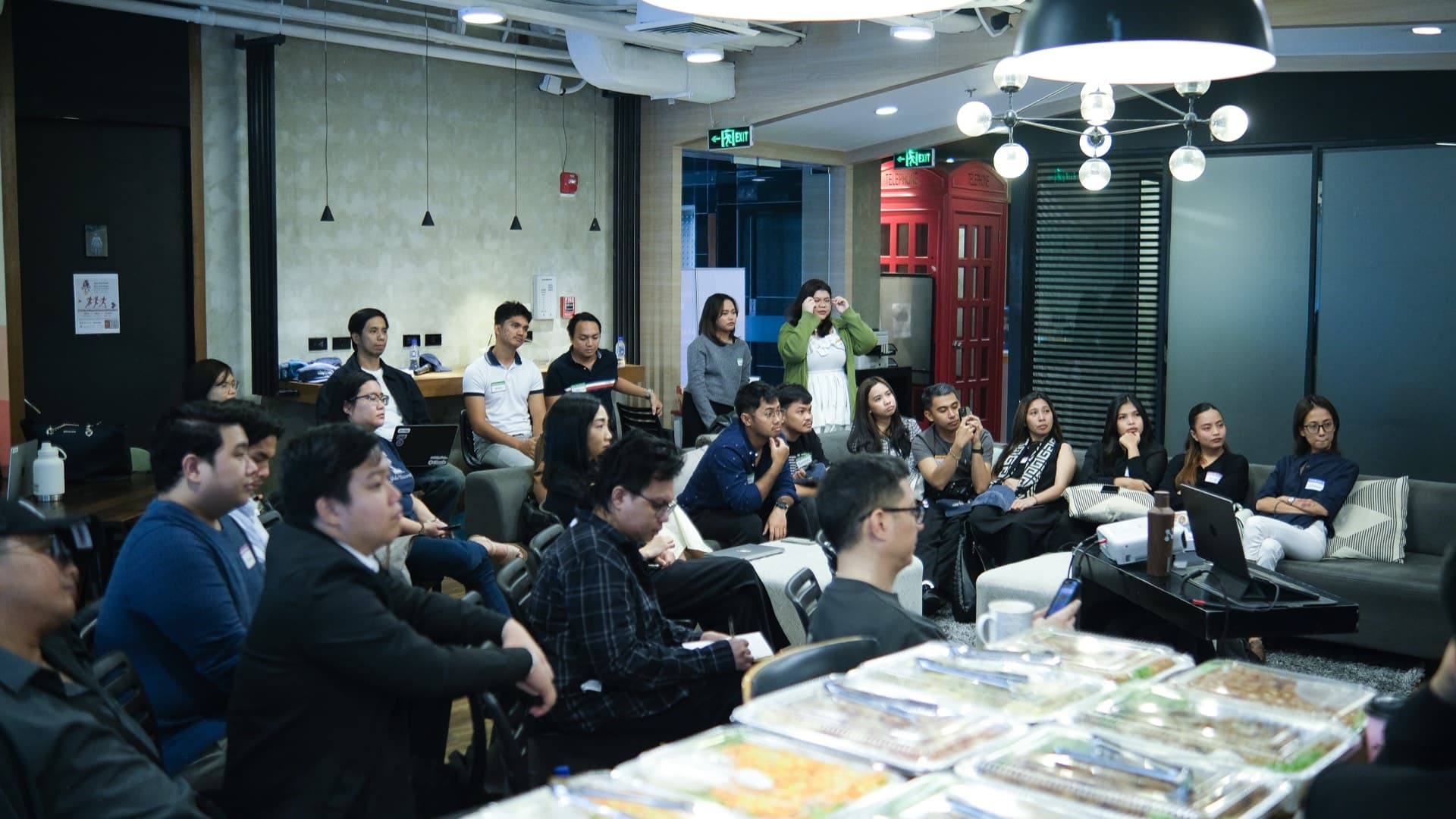 Clay Club Manila attendees watching Wesley Hoang present on GTM engineering at Acceler8 Rockwell Makati