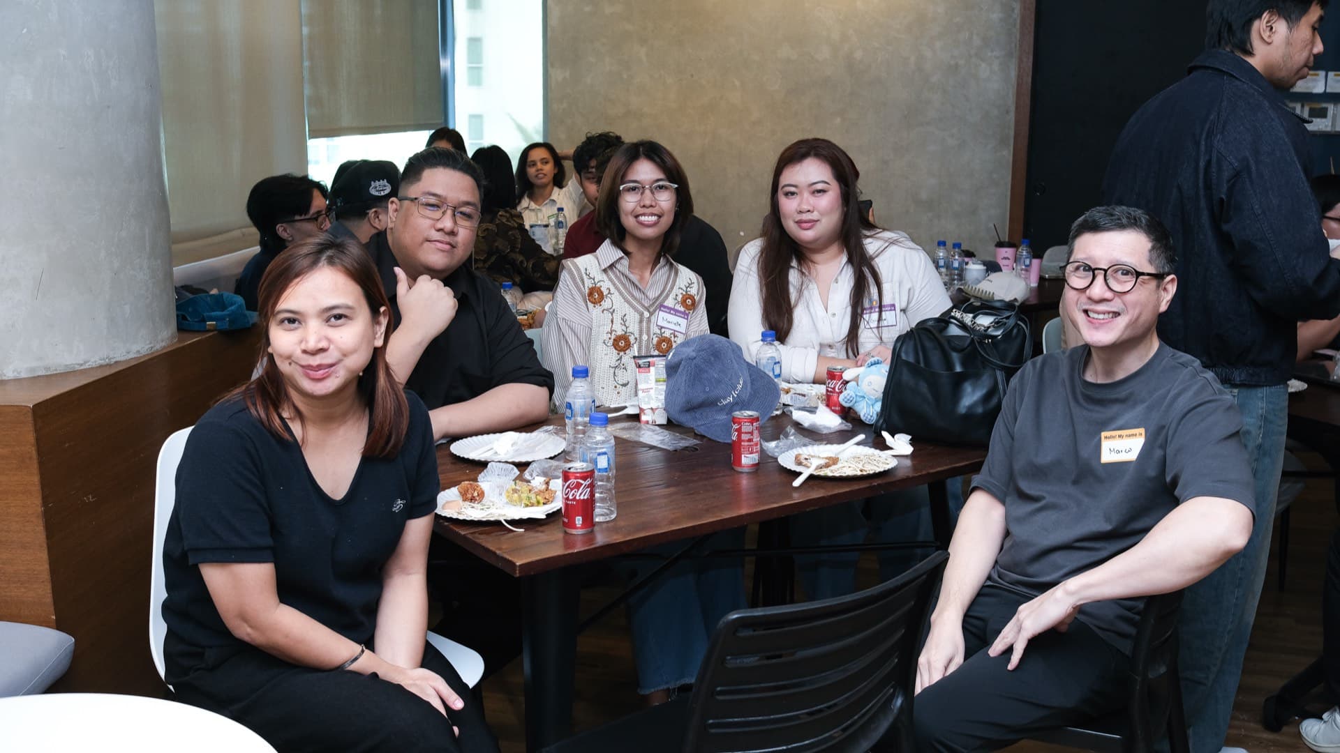 Five Clay Club Manila members networking over food at Acceler8 Rockwell Makati during the 6th community meetup