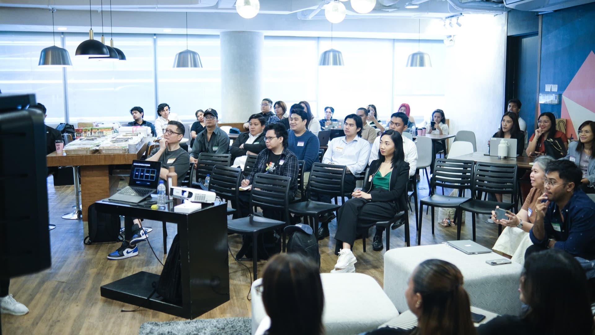 Full room at Clay Club Manila 6th meetup at Acceler8 by UnionSPACE Rockwell Makati with 40+ attendees watching presentation